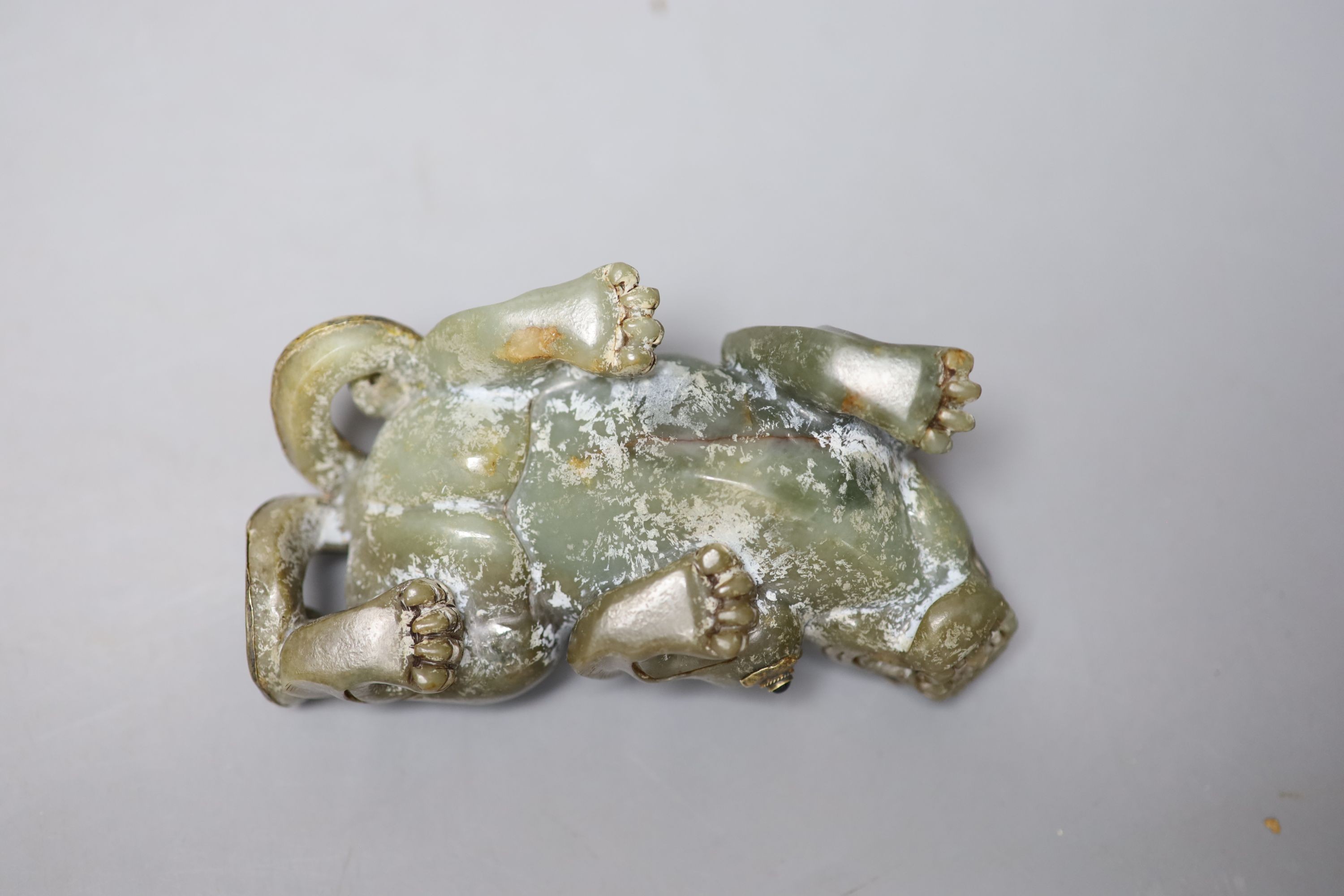 A Chinese celadon jade and gilt metal mounted figure of a Pixiu, 12cm long